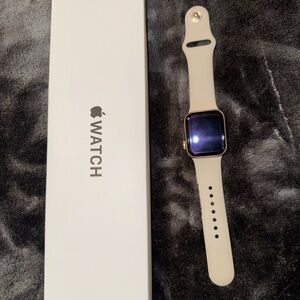 Apple Smartwatch with Gold Case and Cream Band
